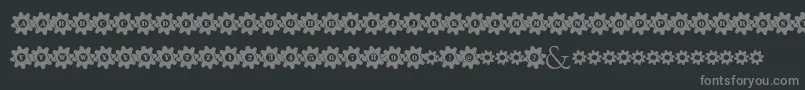Шрифт StuckedInGears – серые шрифты на чёрном фоне