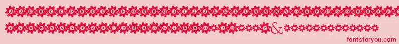 StuckedInGears-Schriftart – Rote Schriften auf rosa Hintergrund