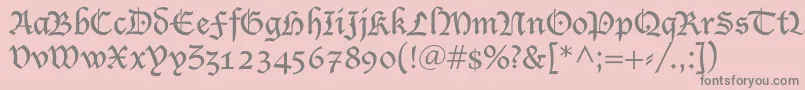 フォントLucidaBlacklet – ピンクの背景に灰色の文字