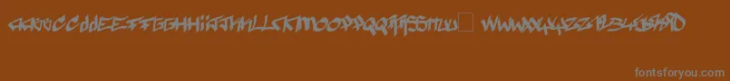 Pyromane-Schriftart – Graue Schriften auf braunem Hintergrund