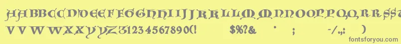 Goticacaps Font – Gray Fonts on Yellow Background
