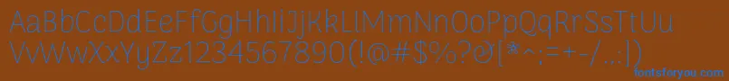 ArimamaduraiThin Font – Blue Fonts on Brown Background