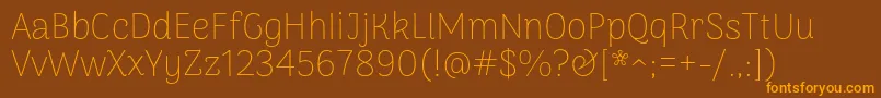 Шрифт ArimamaduraiThin – оранжевые шрифты на коричневом фоне
