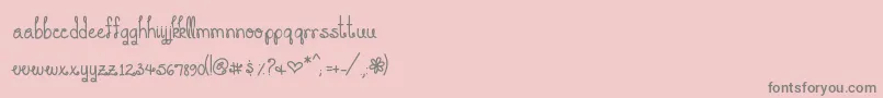 fuente YouMakeMeSmile – Fuentes Grises Sobre Fondo Rosa