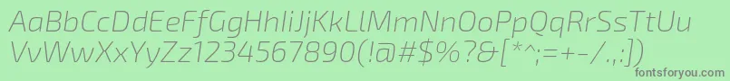 フォントExo2Extralightitalic – 緑の背景に灰色の文字