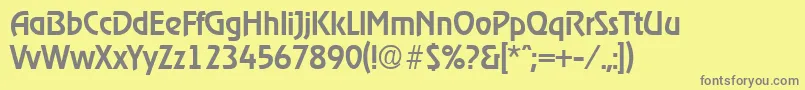 RagtimeMedium-fontti – harmaat kirjasimet keltaisella taustalla