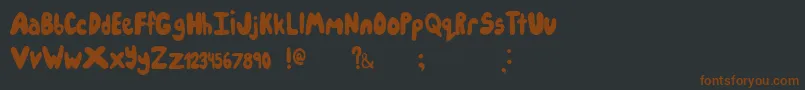 Шрифт Icecreampartysolid – коричневые шрифты на чёрном фоне