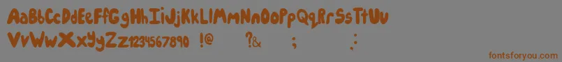 Шрифт Icecreampartysolid – коричневые шрифты на сером фоне
