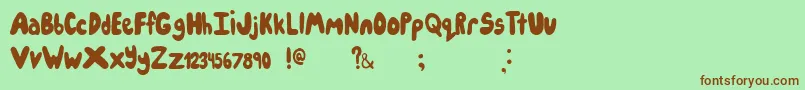 Шрифт Icecreampartysolid – коричневые шрифты на зелёном фоне