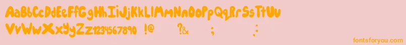 フォントIcecreampartysolid – オレンジの文字がピンクの背景にあります。