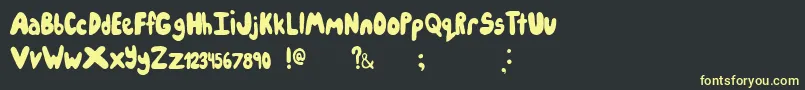 Шрифт Icecreampartysolid – жёлтые шрифты на чёрном фоне