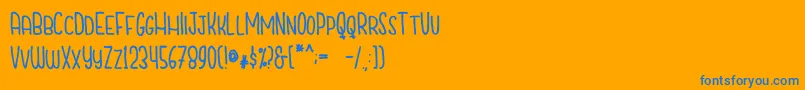 fuente CutiescapsFree – Fuentes Azules Sobre Fondo Naranja