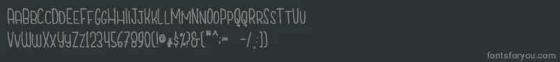 CutiescapsFree Font – Gray Fonts on Black Background