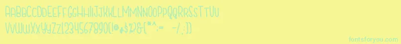 CutiescapsFree Font – Green Fonts on Yellow Background