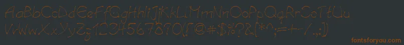 LinotypesalamanderRegular-fontti – ruskeat fontit mustalla taustalla