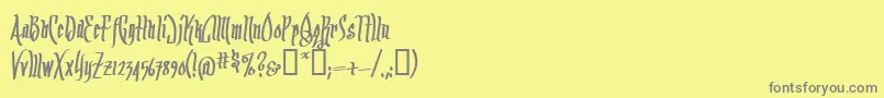 フォントArrrmb – 黄色の背景に灰色の文字