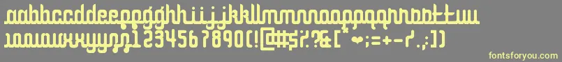 CurvaceousScript-Schriftart – Gelbe Schriften auf grauem Hintergrund