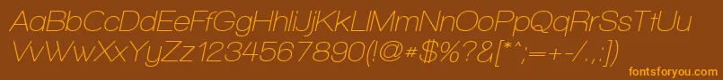フォントWalkwayObliqueSemibold – オレンジ色の文字が茶色の背景にあります。