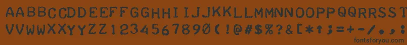 フォントTeleprinterBoldItalic – 黒い文字が茶色の背景にあります