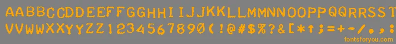 フォントTeleprinterBoldItalic – オレンジの文字は灰色の背景にあります。