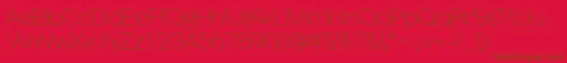 Шрифт PhinsterleftyfineRegular – коричневые шрифты на красном фоне