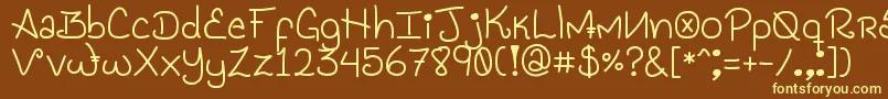 GenesisHandwriting Font – Yellow Fonts on Brown Background