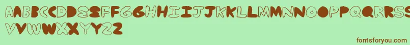 YummyNubs Font – Brown Fonts on Green Background