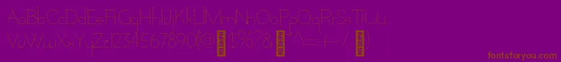 Fonte AdelaideBold – fontes marrons em um fundo roxo