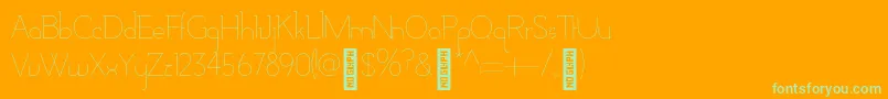 Fonte AdelaideBold – fontes verdes em um fundo laranja