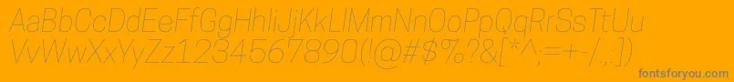 CooperhewittThinitalic-Schriftart – Graue Schriften auf orangefarbenem Hintergrund