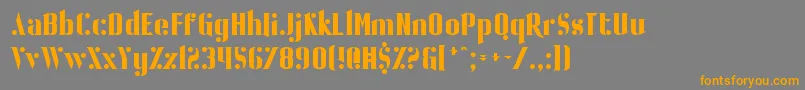 フォントBallBearing – オレンジの文字は灰色の背景にあります。