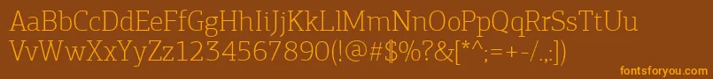 PfagoraslabproThin-Schriftart – Orangefarbene Schriften auf braunem Hintergrund