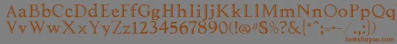 フォントTooled – 茶色の文字が灰色の背景にあります。