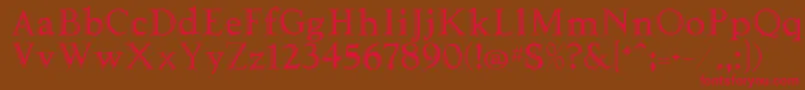 フォントTooled – 赤い文字が茶色の背景にあります。