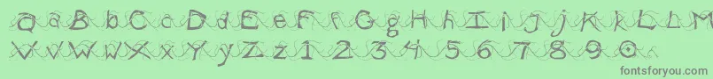 WlentanglementalLight Font – Gray Fonts on Green Background