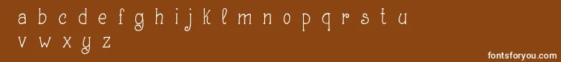 Шрифт MakingLetteringDemo – белые шрифты на коричневом фоне