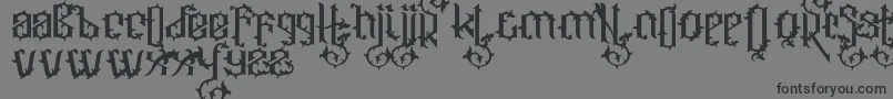 フォントOrnatix – 黒い文字の灰色の背景
