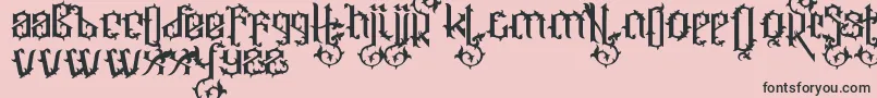 Ornatix-Schriftart – Schwarze Schriften auf rosa Hintergrund