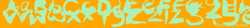 CrazyInkSplats Font – Green Fonts on Orange Background