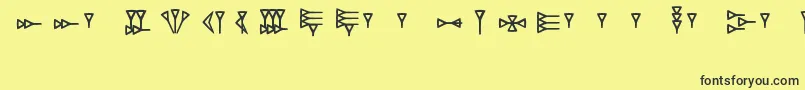 RkUgaritic Font – Black Fonts on Yellow Background