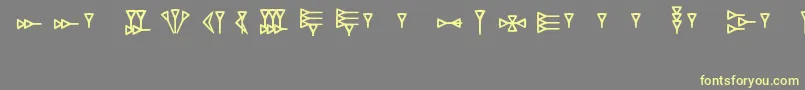 RkUgaritic Font – Yellow Fonts on Gray Background