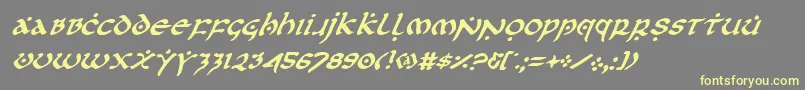 Czcionka Firstv2i – żółte czcionki na szarym tle
