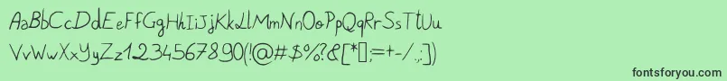 フォントPigeonScribble – 緑の背景に黒い文字