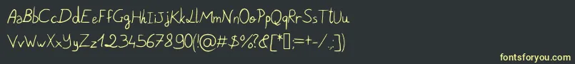 fuente PigeonScribble – Fuentes Amarillas Sobre Fondo Negro