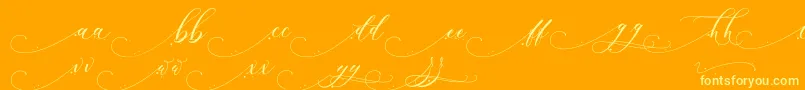 Inkland Font – Yellow Fonts on Orange Background