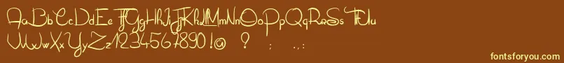 OliverTueLesFourmis-fontti – keltaiset fontit ruskealla taustalla