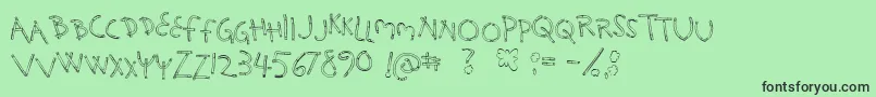 HolySmokes Font – Black Fonts on Green Background