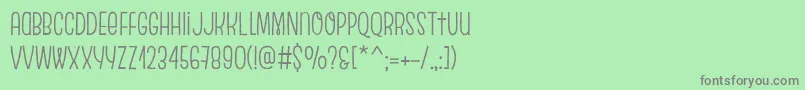 フォントEscalopeCrustTwo – 緑の背景に灰色の文字