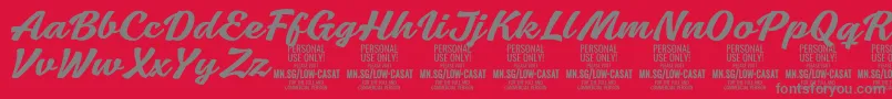 フォントLowcasatmedPersonalUse – 赤い背景に灰色の文字
