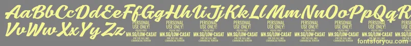 Шрифт LowcasatmedPersonalUse – жёлтые шрифты на сером фоне